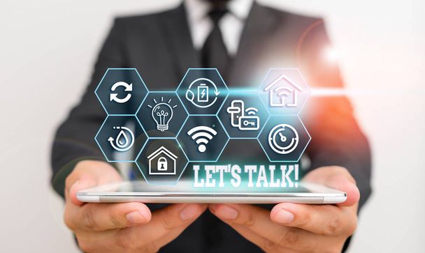 Conceptual hand writing showing Let S Talk. Business photo showcasing they are suggesting beginning conversation on specific topic. - Photo, Image