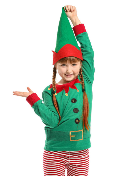 Mała dziewczynka w stroju elfa pokazując coś na białym tle - Zdjęcie, obraz