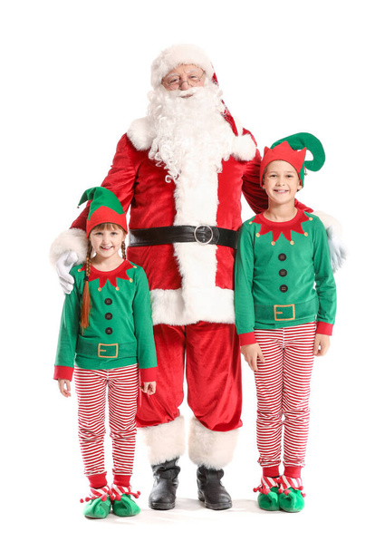 Santa Claus and little elf kids on white background - Фото, зображення