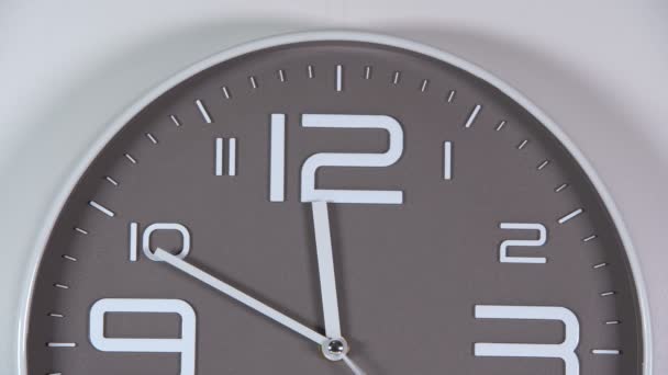 Wall clock on a gray background. Time laps - Footage, Video