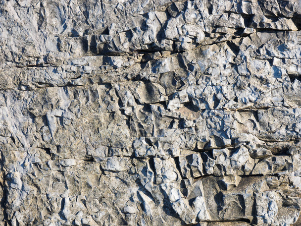 Gray stone cliffs on the coast of the sea. Tuapse, Black Sea, Ca - Zdjęcie, obraz