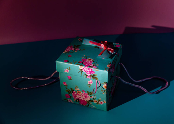 close up of colorful present box on table - Valokuva, kuva