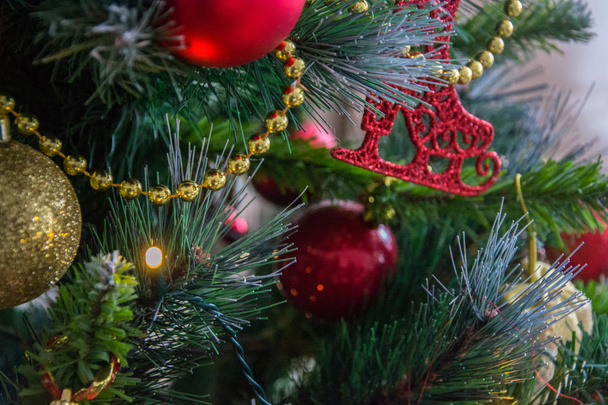 Christmas decoration, xmas toys on the pine tree, holiday concept with shiny balls and pine branches - Fotoğraf, Görsel