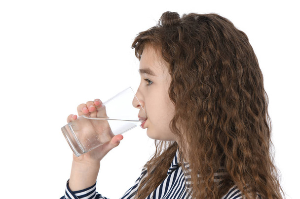 Portrait of a girl drinking mineral water - Fotoğraf, Görsel