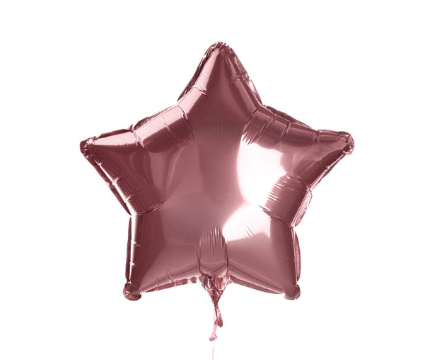 Pink shiny foil star shaped balloon isolated on white - Fotoğraf, Görsel