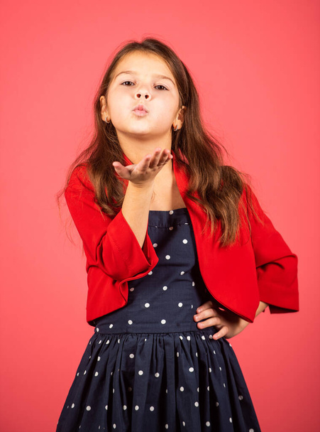 Air kissing. Little child send air kiss. Small girl in fashion style. Style and fashion. Keep elegance in style. Fashion style for festive days. Beauty salon - Фото, зображення
