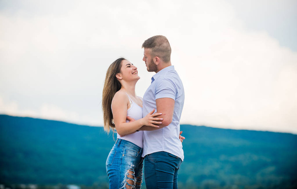 Supporting her. Cute relationship. Man and woman cuddle nature background. Together forever. Love story. Just married. Honeymoon concept. Romantic relations. True love. Family love. Couple in love - 写真・画像