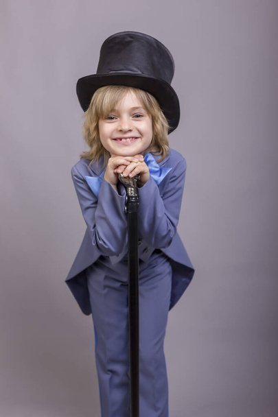 Cute child dressed like gentleman. - Fotó, kép