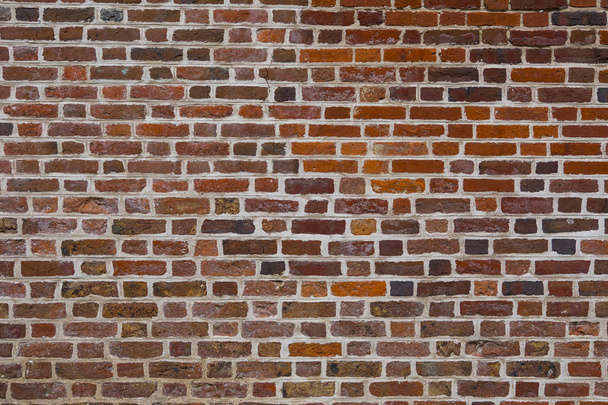 Vista de la fachada de la antigua pared de ladrillo rojo para el fondo de diseño
 - Foto, Imagen