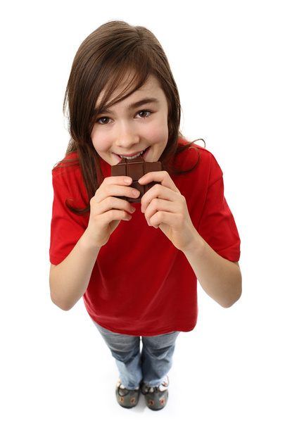 Girl eating bar of chocolate - Fotoğraf, Görsel
