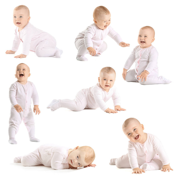 Cute little baby learning to walk on white background  - Photo, Image