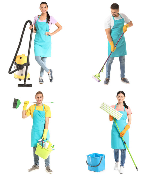 Team of janitors with cleaning supplies on white background - Foto, afbeelding