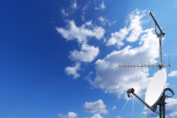 Satellite Dish and Antenna TV on Blue Sky - Photo, Image