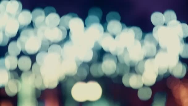 colorful blurred bokeh lights background in cold tones abstract sparkles  - Footage, Video