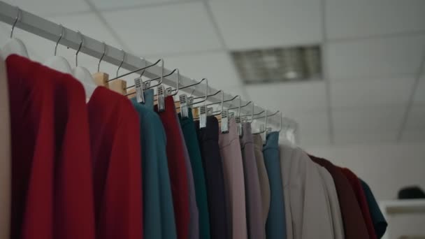 Clothes rail in modern shop. - Footage, Video