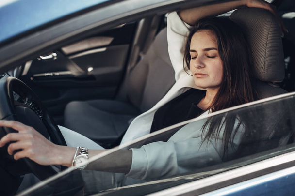 Fashion Stylish Driver Girl in White Suit Sitting in the Car - Φωτογραφία, εικόνα