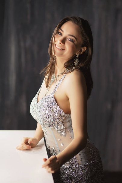 Gorgeous young woman posing in a studio - Photo, Image