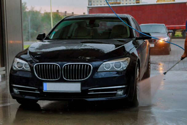 Uzhhorod, Ukraine, 7 August 2019: Self-service car wash. Wash high pressure water and foam. - Photo, image