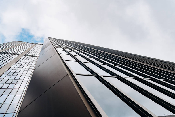 Blue skyscraper facade. office buildings. modern glass silhouettes - Φωτογραφία, εικόνα