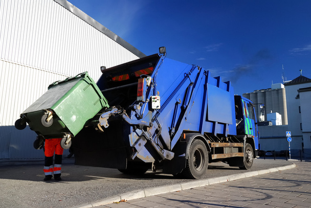 Garbage transport car loading itself in port. Landfill site, ecology, environmental damage, pollution, infrastructure, industry, special equipment, reuse, recycle, zero waste concept. Sweden - Photo, Image