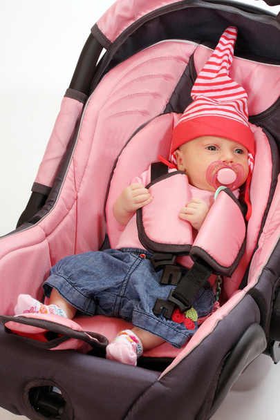 Vauva turvaistuimessa. Turvallisuus- ja vakuutuskäsite
 - Valokuva, kuva