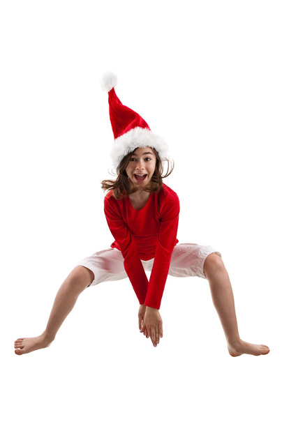 Girl in Santa's Hat jumping - Fotoğraf, Görsel