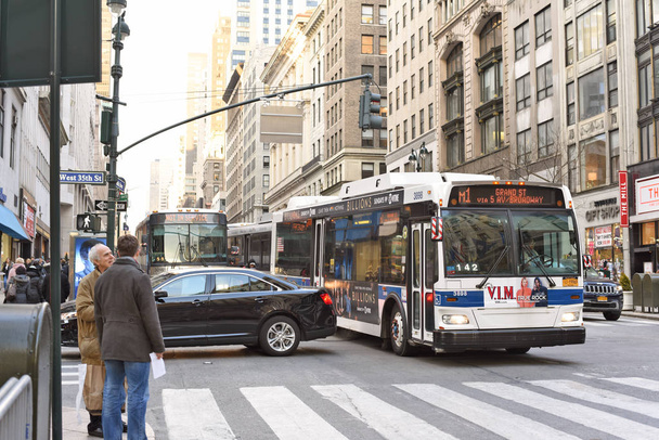 New York, United States of America- March, 8, 2019: Bus of Metropolitan Transportation Authority (MTA) on the city street.  - Photo, image