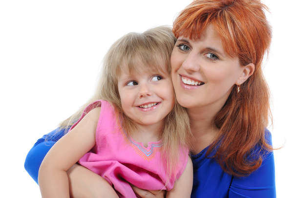Red-haired woman with her daughter - Photo, image