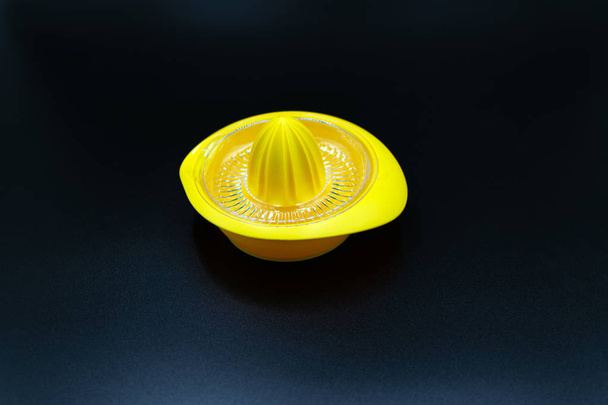 empty, yellow lemon squeezer  - Photo, Image