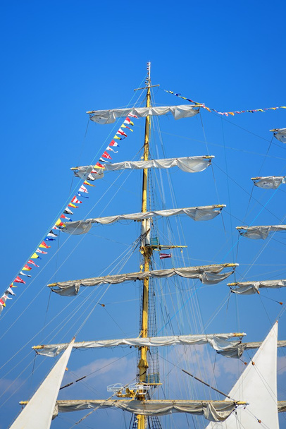 Close-up of an old historical tall ship masts with white sails - Photo, Image