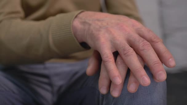Old male shaking hands, aging diseases, elderly health care, nursing home - Video