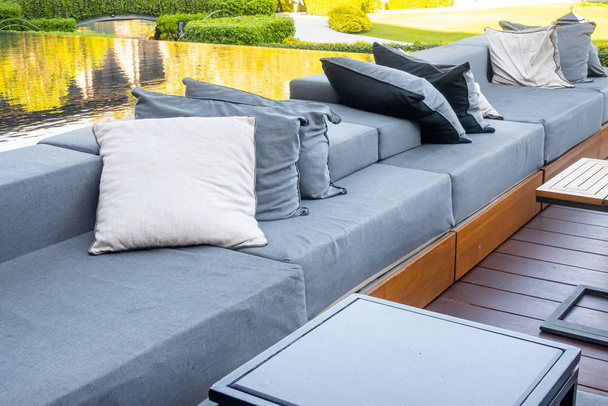 pillows with outdoor patio deck and sofa - Foto, afbeelding