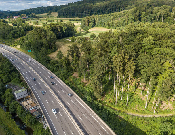  Aerial view of highway bridge in forest in Switzerland, Europe - Fotoğraf, Görsel