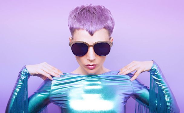 Futuristic model with violet hair. Trendy haircut - Photo, image
