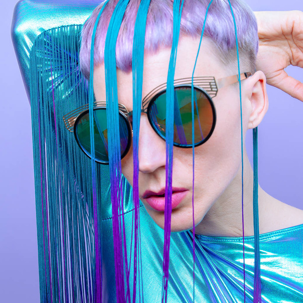 Futuristic Lady with violet hair. Trendy haircut concept - Fotó, kép