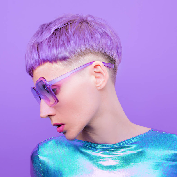 Futuristic Fashion Lady with violet short hair. Trendy hair styl - Fotó, kép