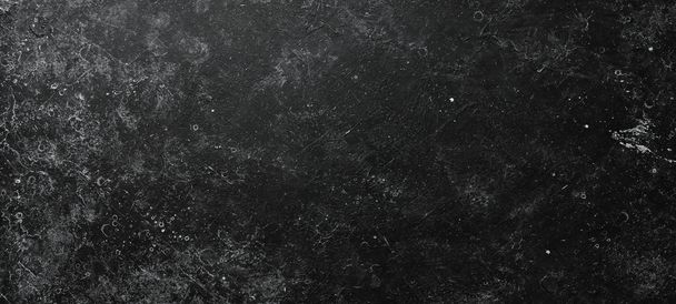 Black stone background. Stone texture. Top view. Free space for your text. - 写真・画像