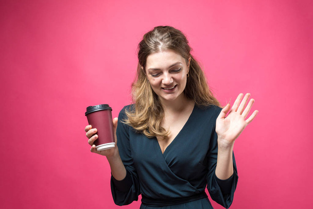 young beautiful woman with coffee cup on color background - Photo, Image