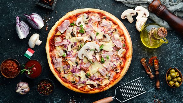 Traditional Italian pizza with mushrooms and bacon. Top view. free space for your text. Rustic style. - 写真・画像
