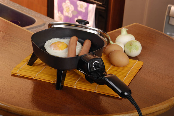Оборудование для домашней кухни; электрический универсальный котел
. - Фото, изображение