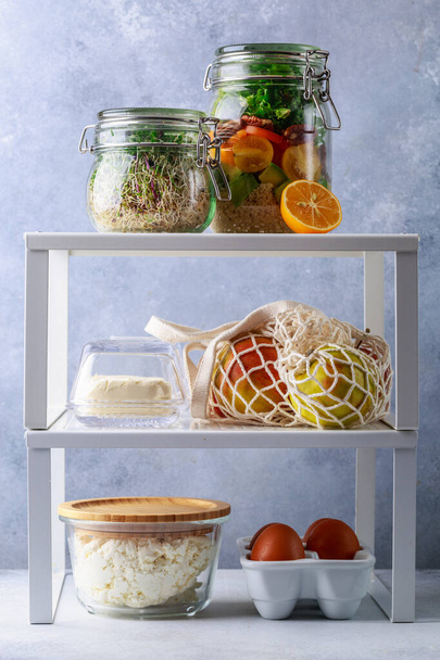 Glass boxes and cans with fresh food refrigerator storage concept decanting - Valokuva, kuva