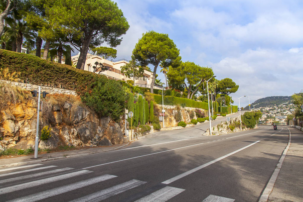 Villefranche-sur-Mer, France, October 10, 2019. Picturesque mountain road along the sea - Photo, image