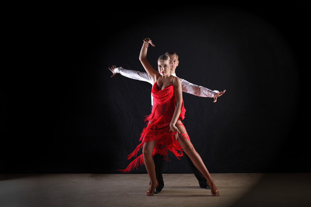 Latino dancers in ballroom isolated on black - Фото, зображення