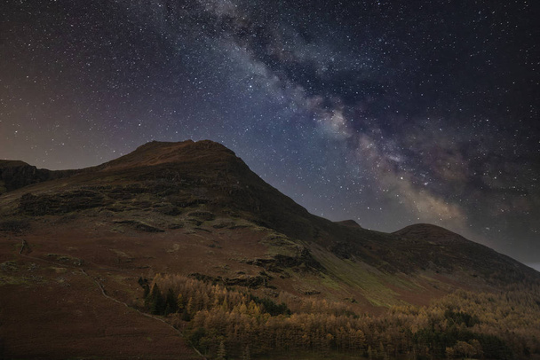 Stunning majestic digital composite landscape of Milky Way over  - Photo, Image