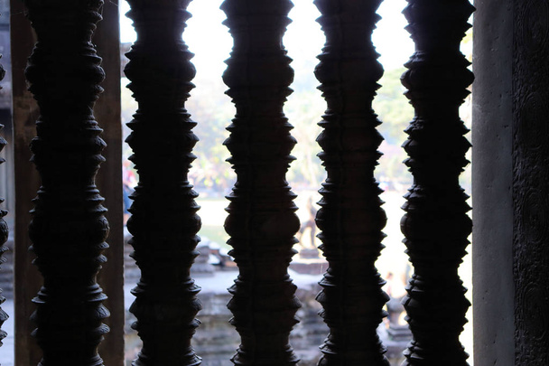 виды великолепных фасадов Ангкора, экзотическая поездка в Камбодиа, путешествие в Азию
 - Фото, изображение