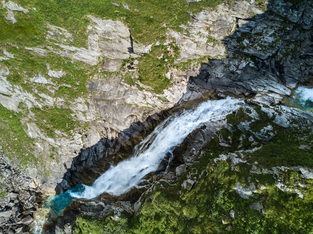 Aerial view of waterfall in Swiss mountains - Foto, Imagen