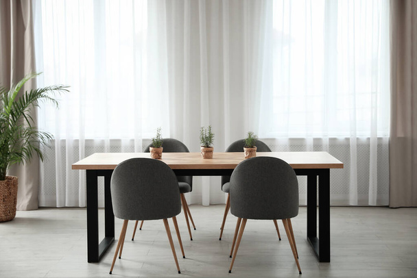 Modern room interior with chairs and table - Foto, immagini