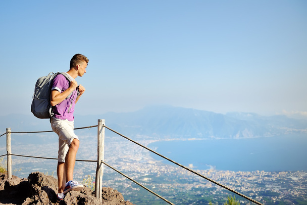 Hiker with backpack on Vesuvius looking panorama - Fotoğraf, Görsel
