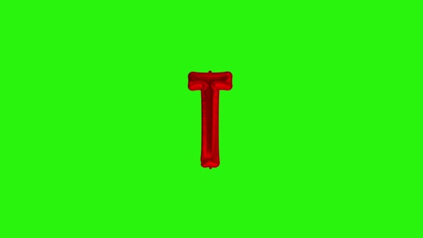 Kırmızı harf T. Kırmızı folyo helyum balonu alfabesi yeşil ekranda yüzüyor. - Video, Çekim