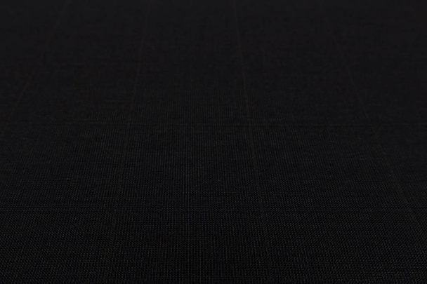 zbliżenie piękny czarny tkanina z tekstylny tekstura tło - Zdjęcie, obraz